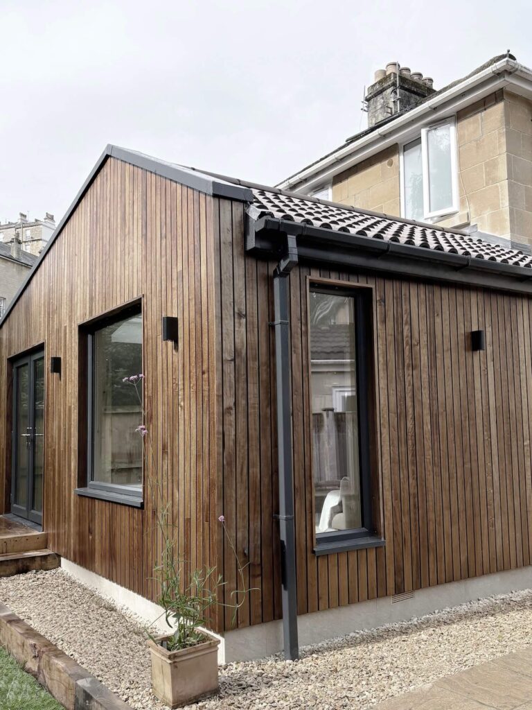Rear view of timber-clad extension in Bath