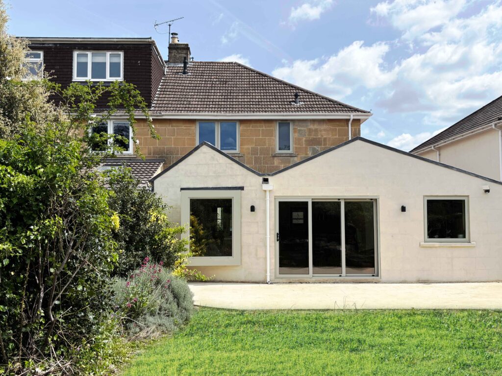 Stone extension with vaulted roof garden view
