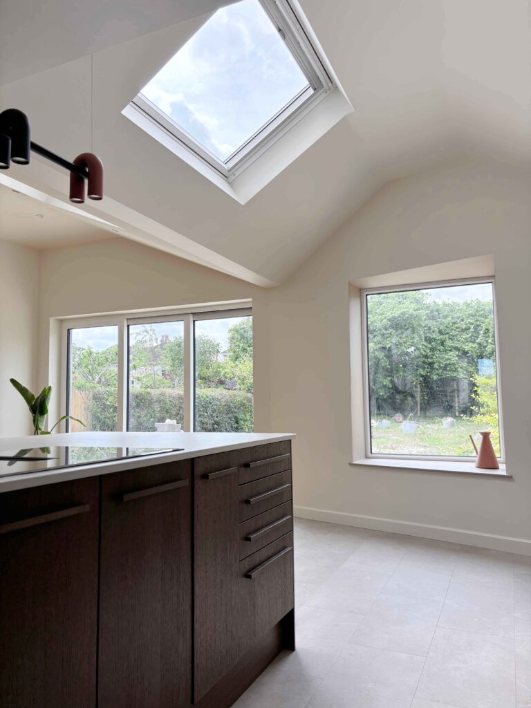 Stone extension with vaulted roof looking towards garden